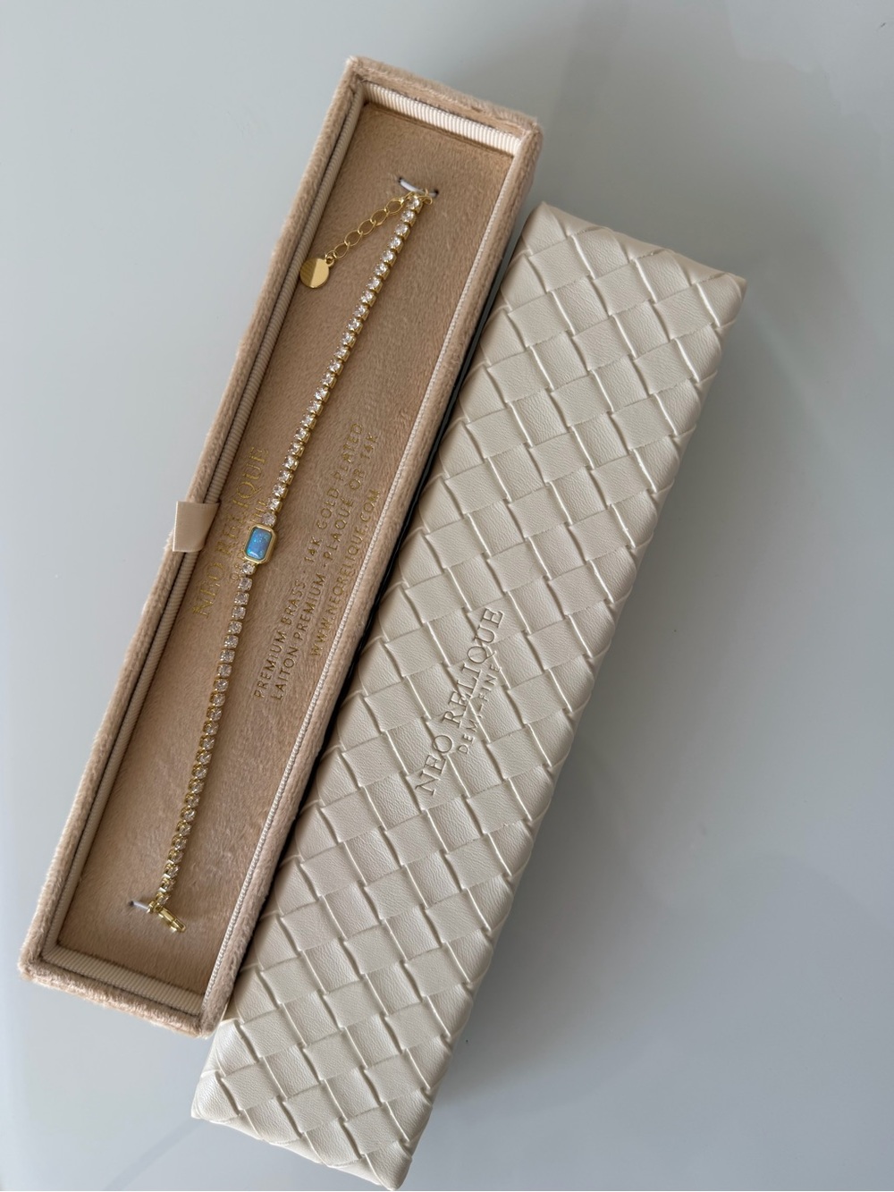 Gold Tennis Bracelet with Blue Opal Accent